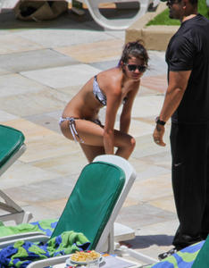 th 800527247 Celebutopia netSelenaGomez28 122 511lo Selena Gomez gets a Brazilian tan while at a pool at her hotel in Rio 2 4 12 x36