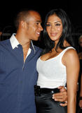 Nicole Scherzinger very busty showing a great cleavage in white tank top at Madden NFL '09 VIP premiere party