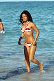 Christina Milian in striped bikinis