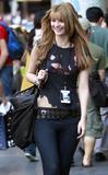 Misha Barton shows her bra wearing teared tshirt while walking the streets of Sydney
