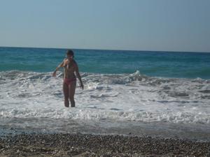 Unknown girl playing topless in Korfu beach Greece-s4evc0r1ig.jpg